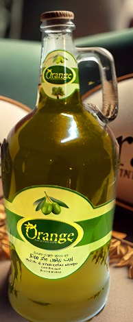 extra virgin pure olive oil in glass jar